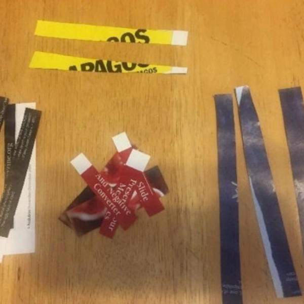 Cut out strips of magazine