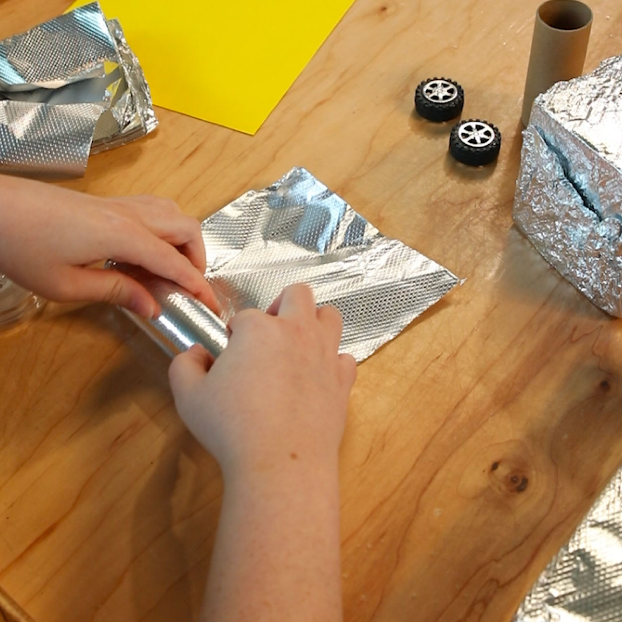 Paper towel roll arms for robot