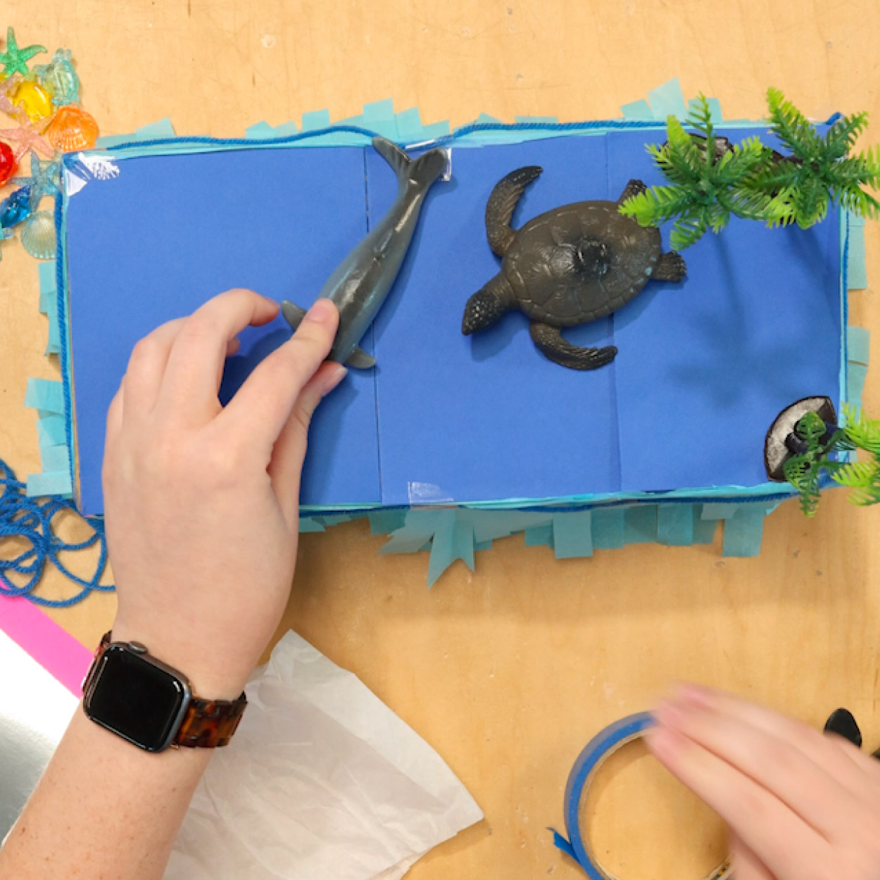 Decorate shoe box with a fun theme