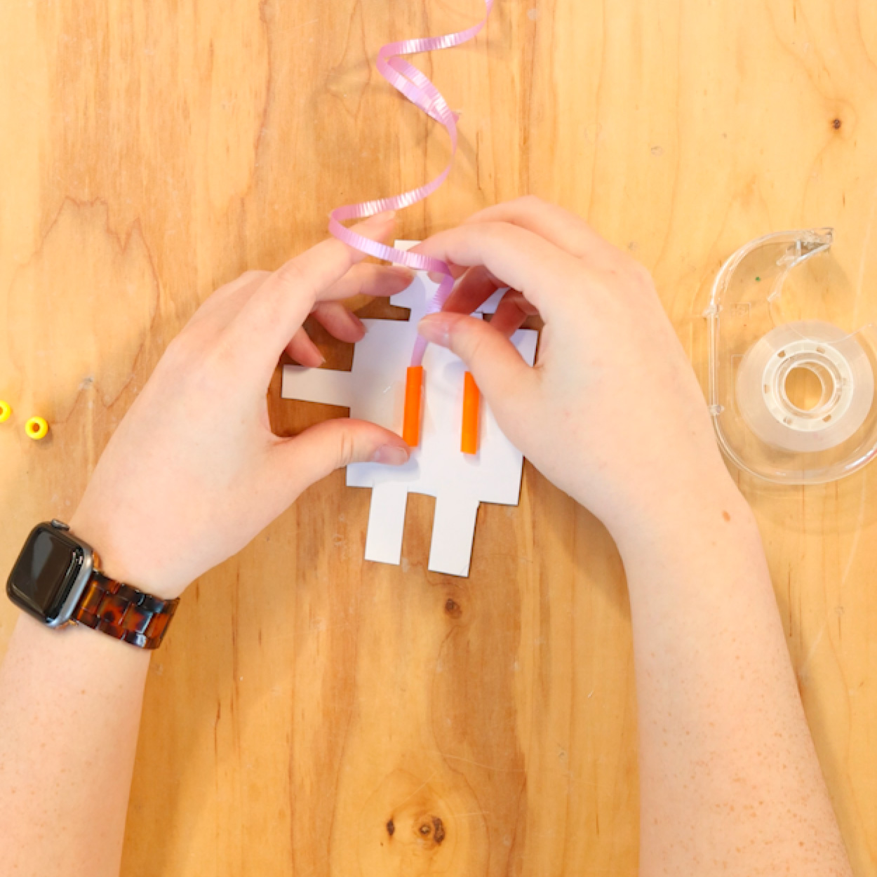 Thread string through straws