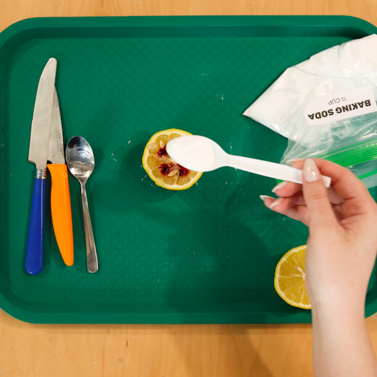 Add baking soda to lemon